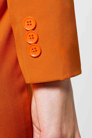 Woman wearing orange dress suit