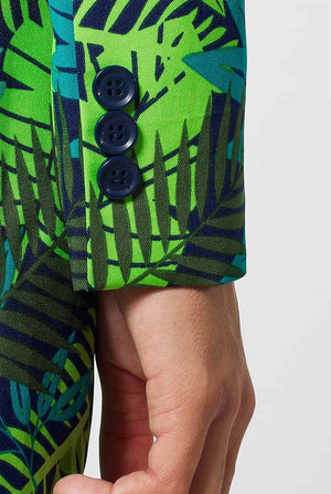 Woman wearing suit with green jungle leaves print