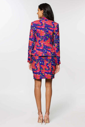 Woman wearing pink and purple suit with retro print
