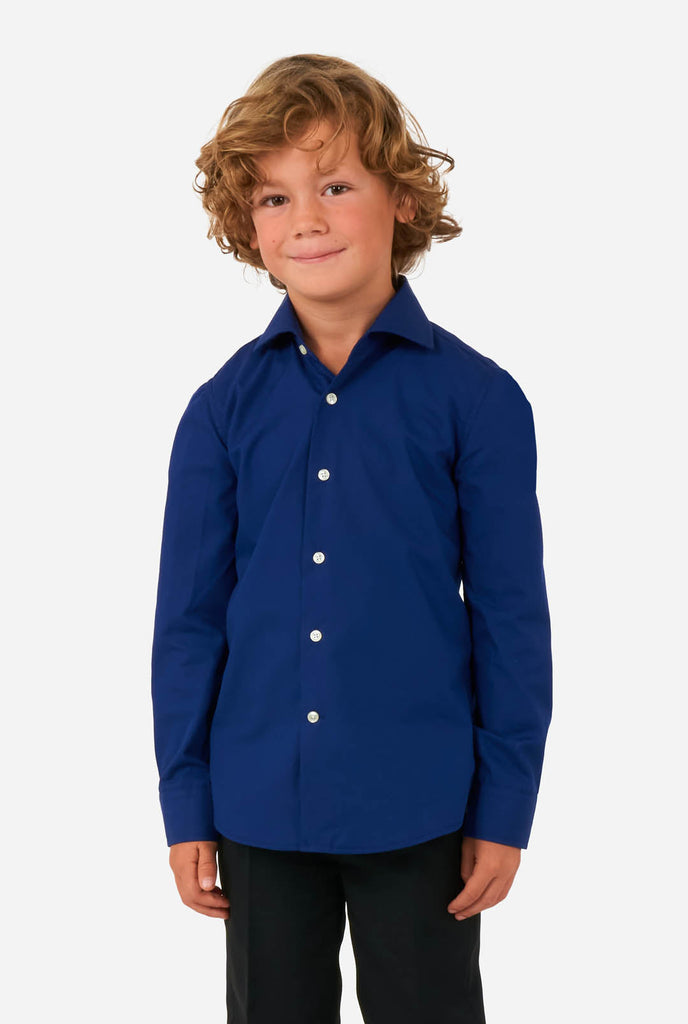 Boy wearing blue dress shirt and black pants