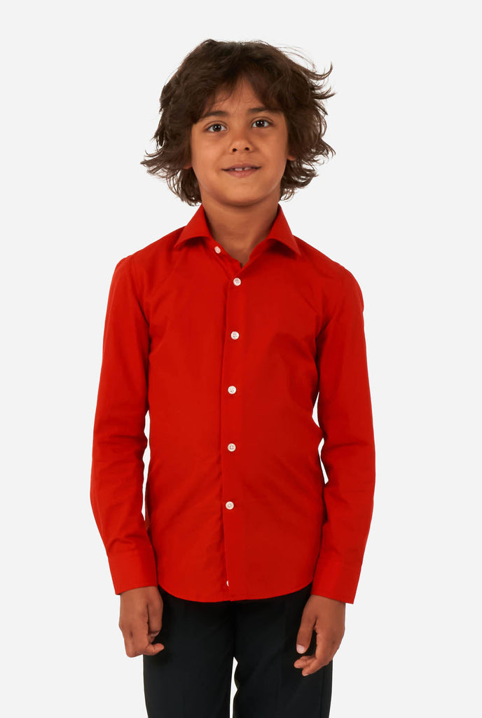 Boy wearing red dress shirt and black pants