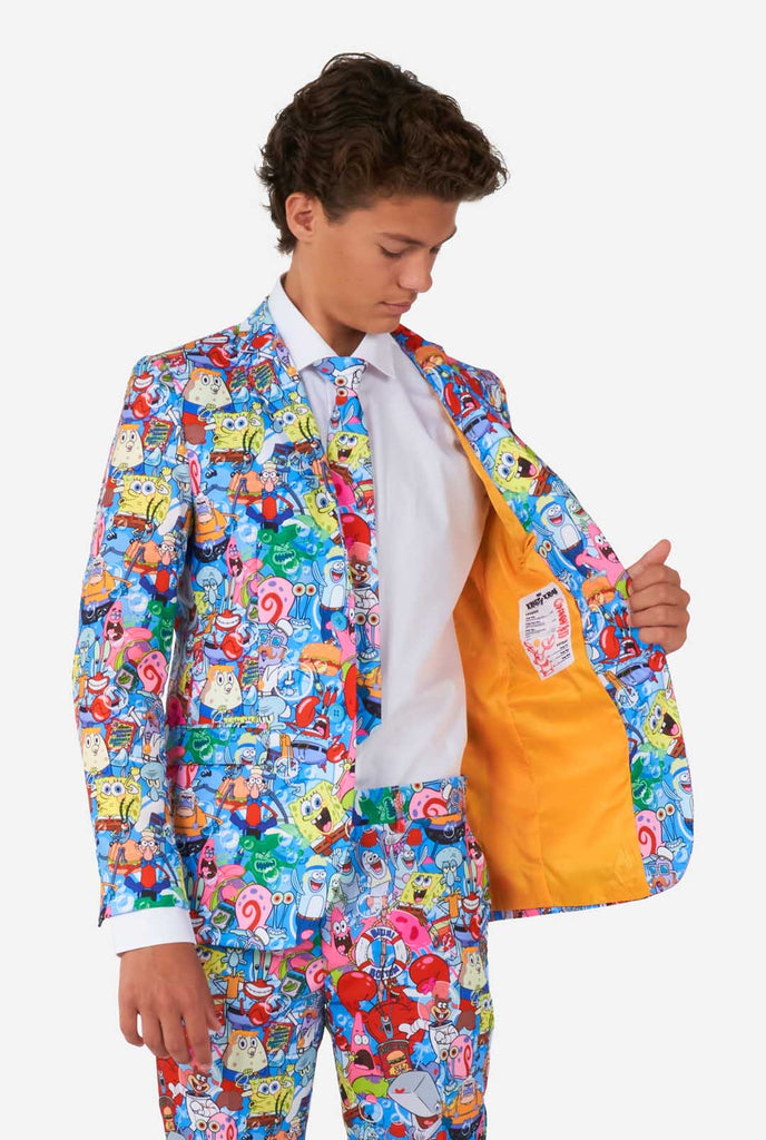Teen wearing suit with Spongebob print