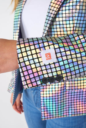 Woman wearing blazer with disco ball mirror print, sleeve close up
