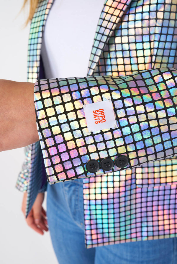 Woman wearing blazer with disco ball mirror print, sleeve close up