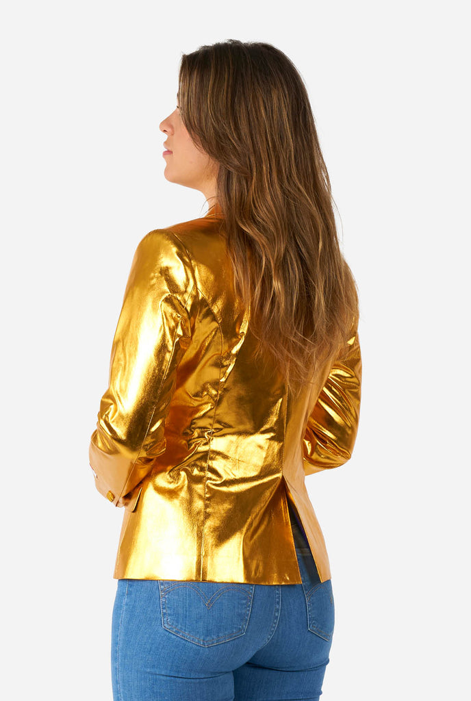 Woman wearing golden blazer