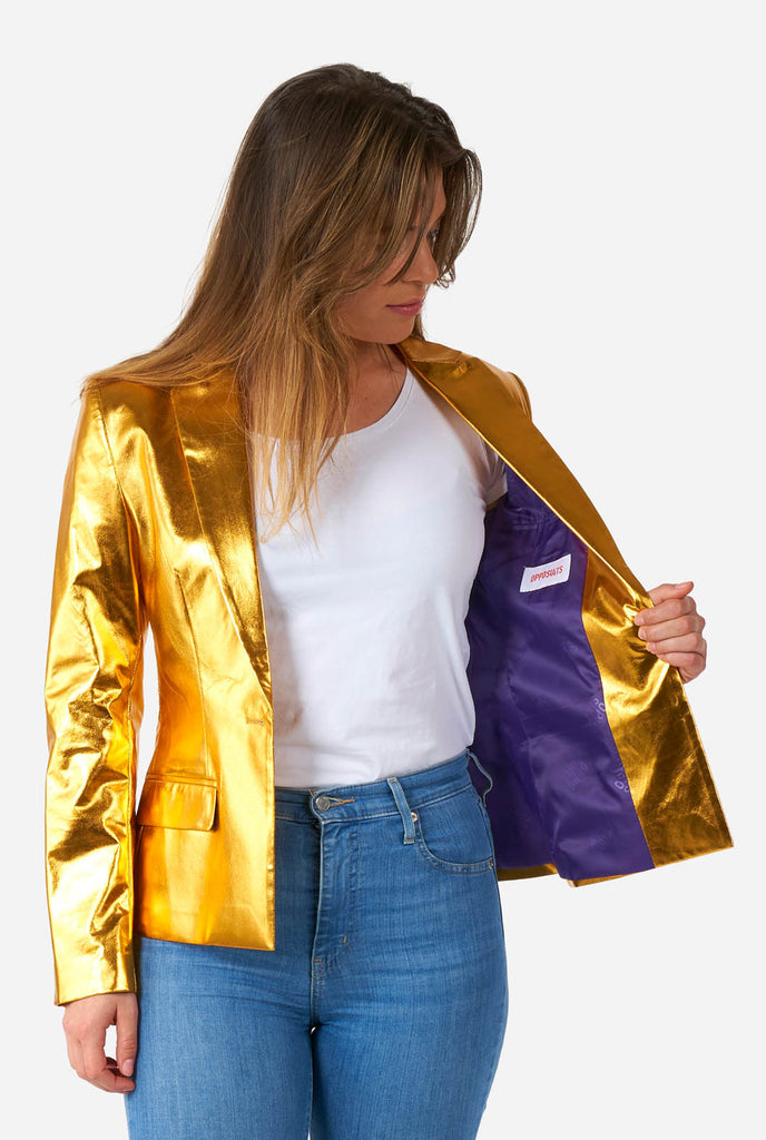 Woman wearing golden blazer