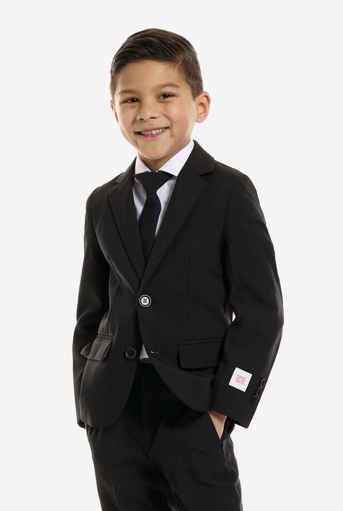 Kid wearing OppoSuits Black suit.