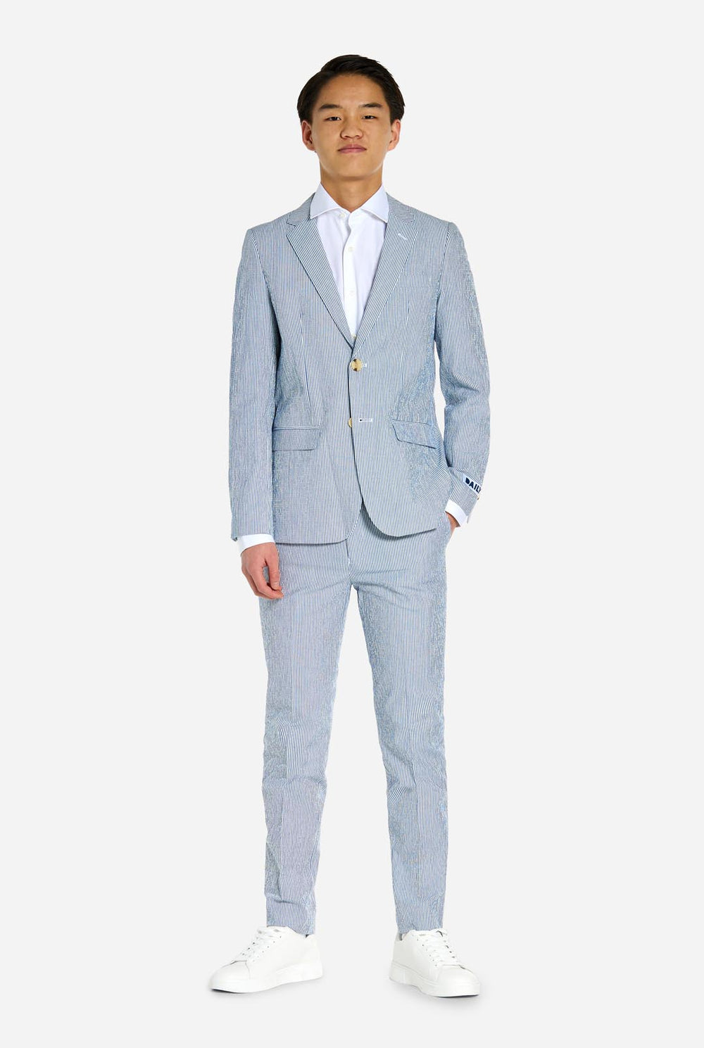 Teen wearing Seersucker suit.