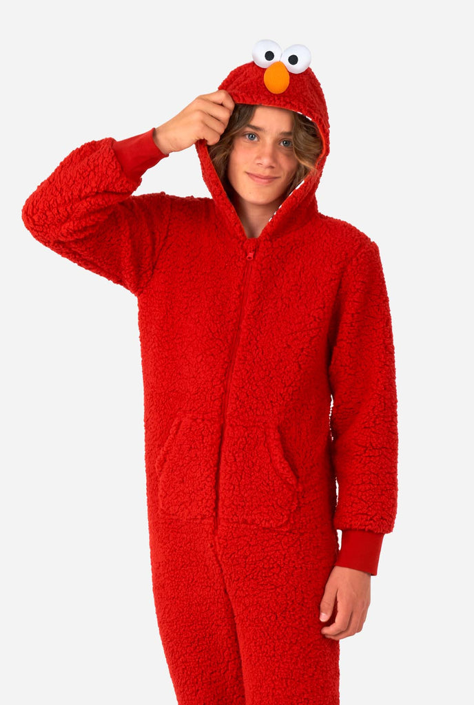 Kid wearing red pluche Elmo onesie