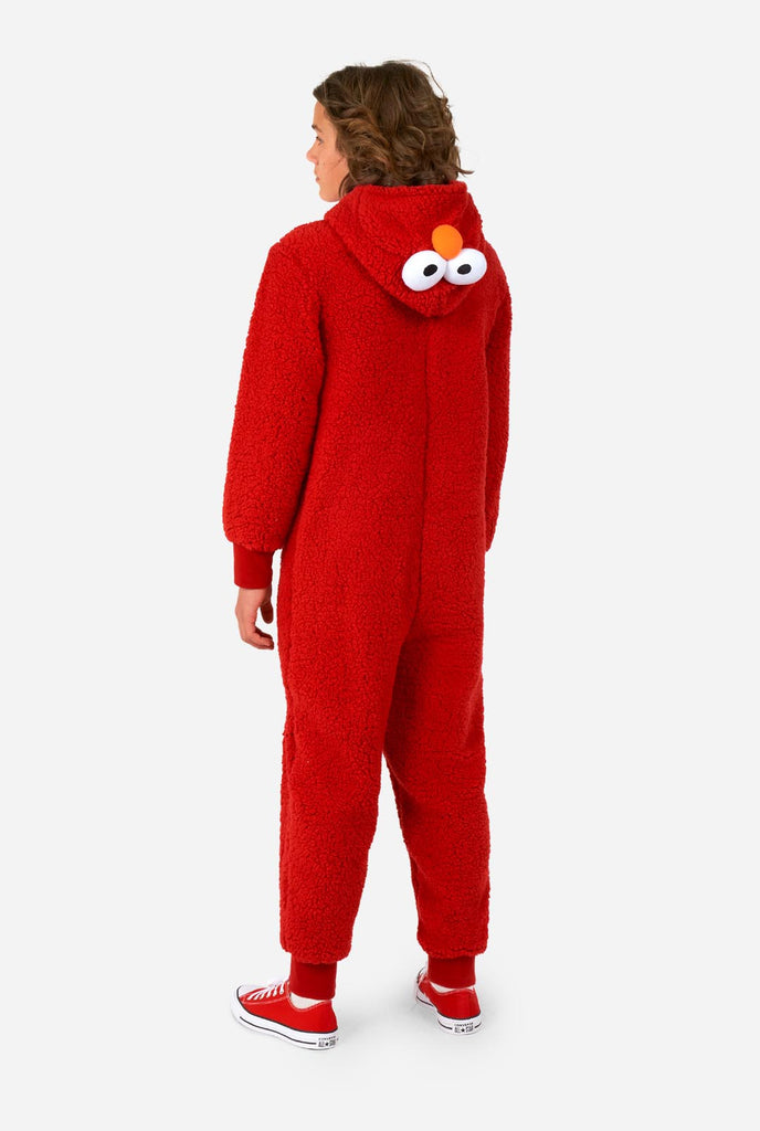 Kid wearing red pluche Elmo onesie, view from the back