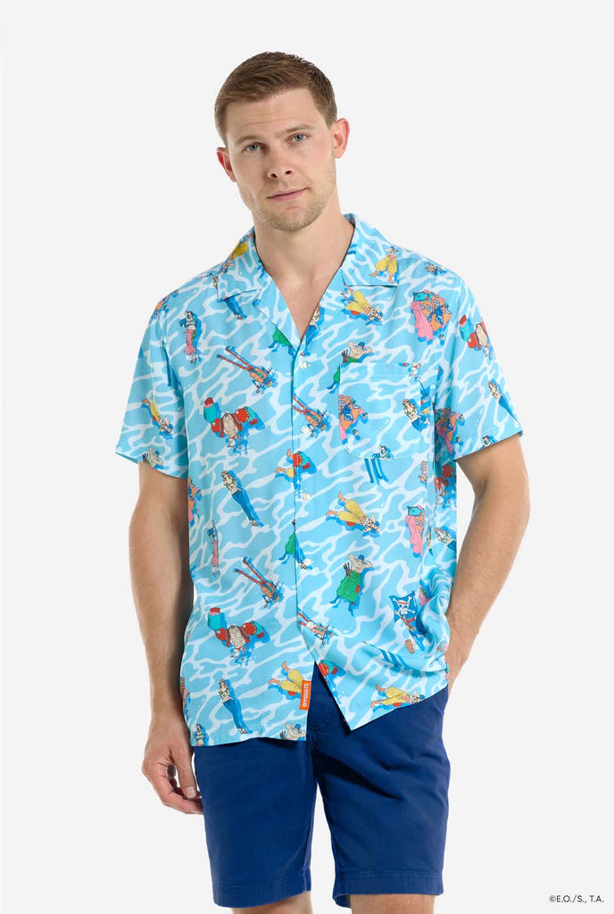 Man wearing blue Hawaiian shirt with One Piece character print.