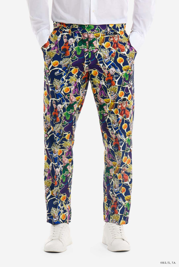 Man wearing all over print men's suit with Dragon Ball Z print which shows the Dragon Ball characters. Suit consists of Blazer, pant and tie. Pants close up.