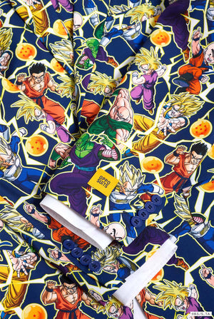 All over print men's suit with Dragon Ball Z print which shows the Dragon Ball characters. Suit consists of Blazer, pant and tie. Close up.