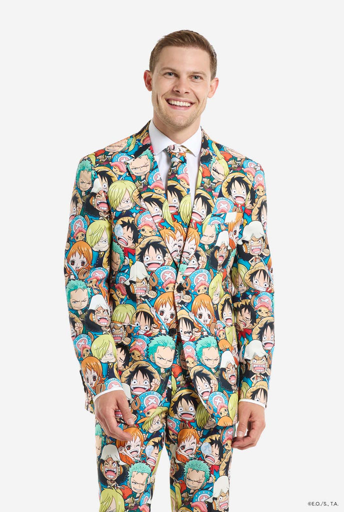 Man is wearing a men's suit with all over One piece print with One Piece characters.