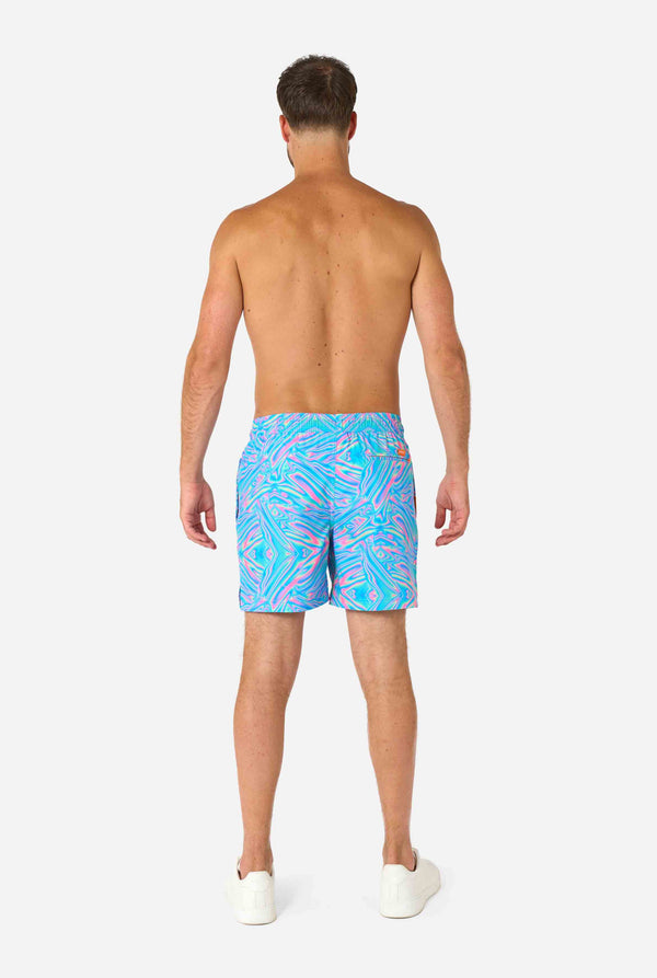 Men's vibrant holographic swim shorts with a mesmerizing blue, pink, and purple swirl design. Eye-catching and stylish swimwear for summer fun.