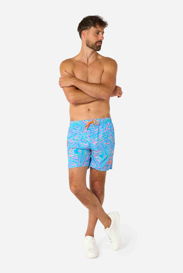 Men's vibrant holographic swim shorts with a mesmerizing blue, pink, and purple swirl design. Eye-catching and stylish swimwear for summer fun.