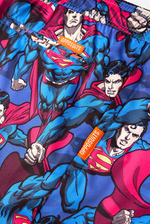 Men's Superman-themed swim shorts featuring a bold comic book design with multiple action poses of the Man of Steel. Perfect for superhero fans looking to make a splash. Close-up pockets.
