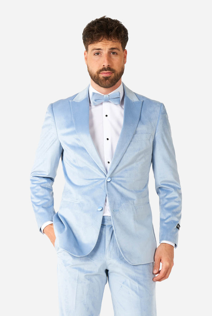 Man wearing blue velvet tuxedo