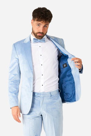 Man wearing blue velvet tuxedo