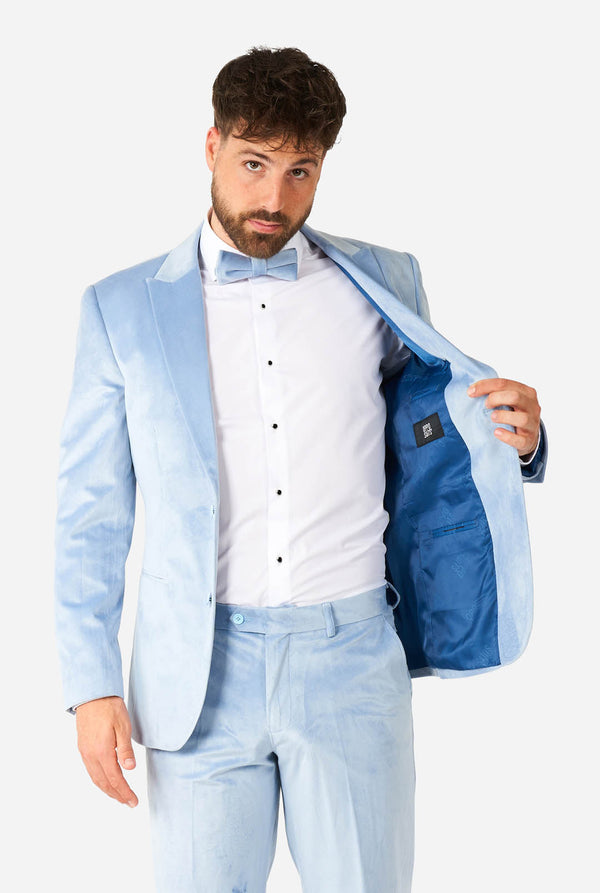 Man wearing blue velvet tuxedo