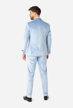 Man wearing blue velvet tuxedo, view from the back