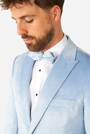 Man wearing blue velvet tuxedo, close up