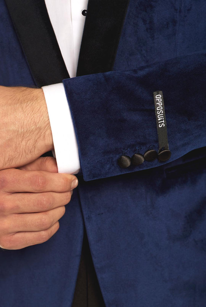 Man wearing navy blue dinner jacket blazer