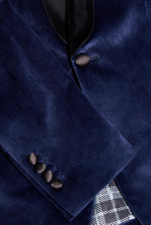 Man wearing navy blue dinner jacket blazer