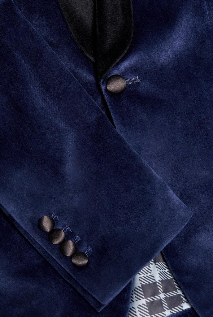 Man wearing navy blue dinner jacket blazer