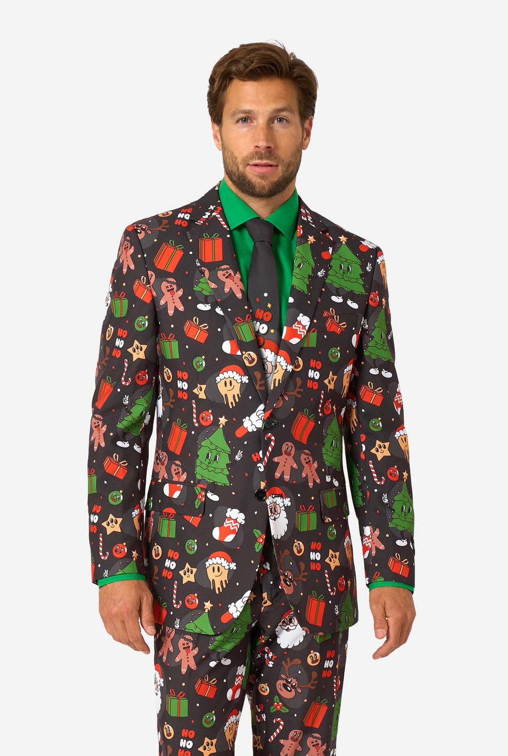 Man wearing a festive suit with Christmas-themed patterns on a white background