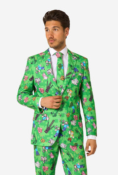 Man wearing a bright green Minecraft suit with iconic characters, including Creepers and Steve – full view from the front.