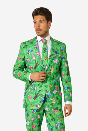Man wearing a bright green Minecraft suit with iconic characters, including Creepers and Steve – full view from the front.