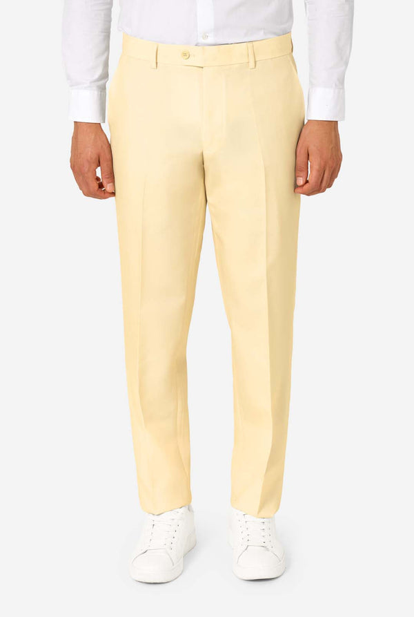 Elegant men's suit in a soft pastel yellow shade, perfect for weddings, summer events, and formal occasions. This stylish tailored suit features a slim fit design, notch lapels, and a matching tie for a sophisticated look. Ideal for modern gentlemen looking to make a statement with a light-colored pastel suit. Close-up pants.