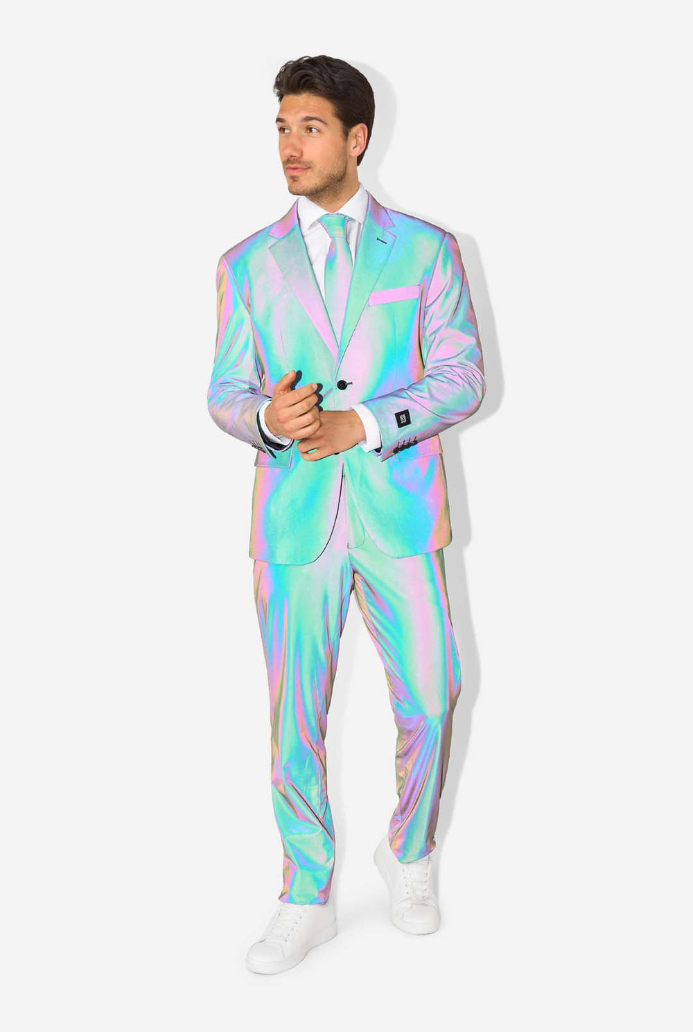 A man wearing a reflective suit, with a reflective tie and a white shirt on a white background. 