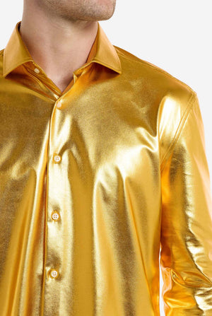 Gold metallic shirt worn by a person on a white background