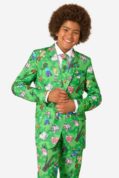 Teen boy wearing a bright green Minecraft suit with iconic characters, including Creepers and Steve – full view from the front.