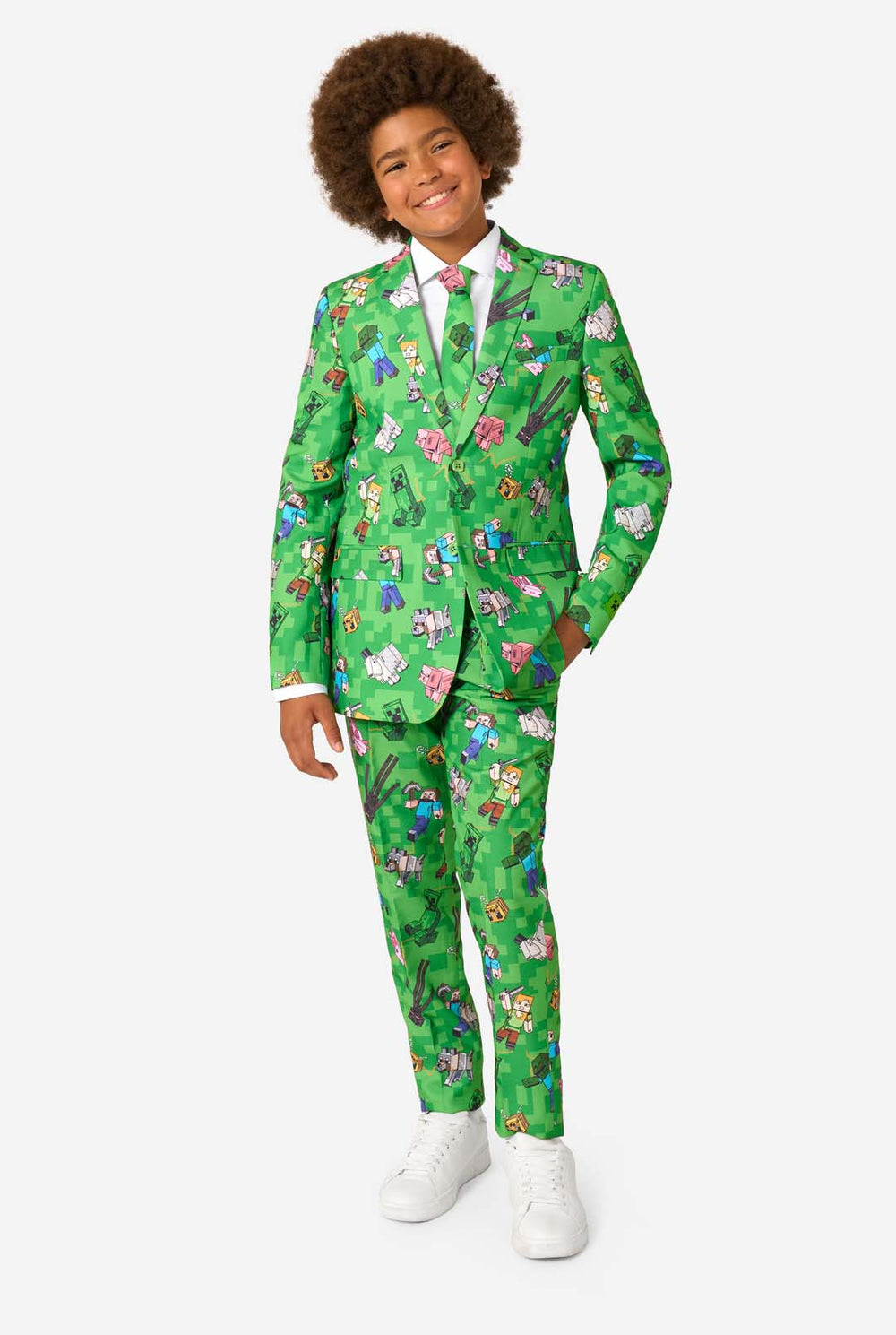 Teen boy wearing a bright green Minecraft suit with iconic characters, including Creepers and Steve – full view from the front.