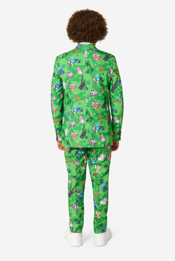 Teen boy wearing a bright green Minecraft suit with iconic characters, including Creepers and Steve – View from the back