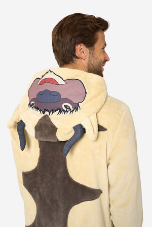 Man wearing a beige and brown fleece Appa onesie with hood featuring Appa’s face, horns, and brown belly patch.