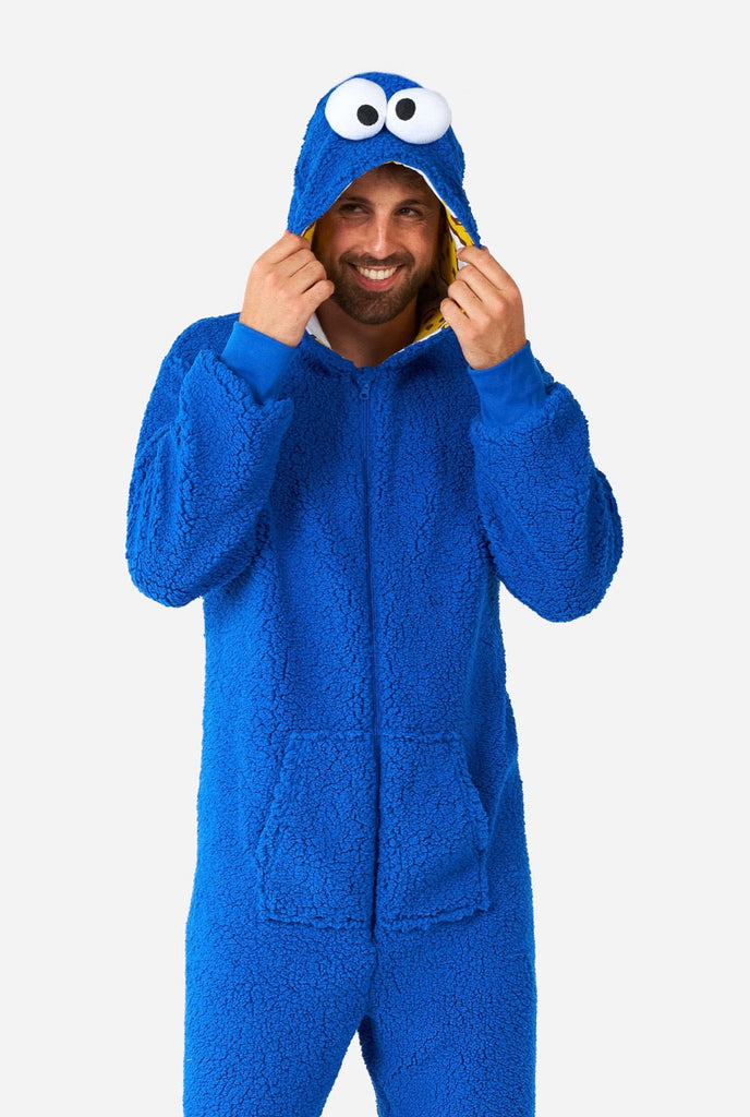 Man wearing blue pluche Cookie Monster onesie