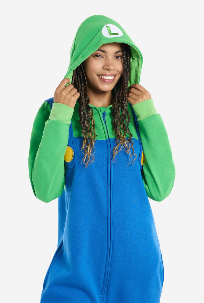 Woman wearing unisex adult onesie with Luigi print
