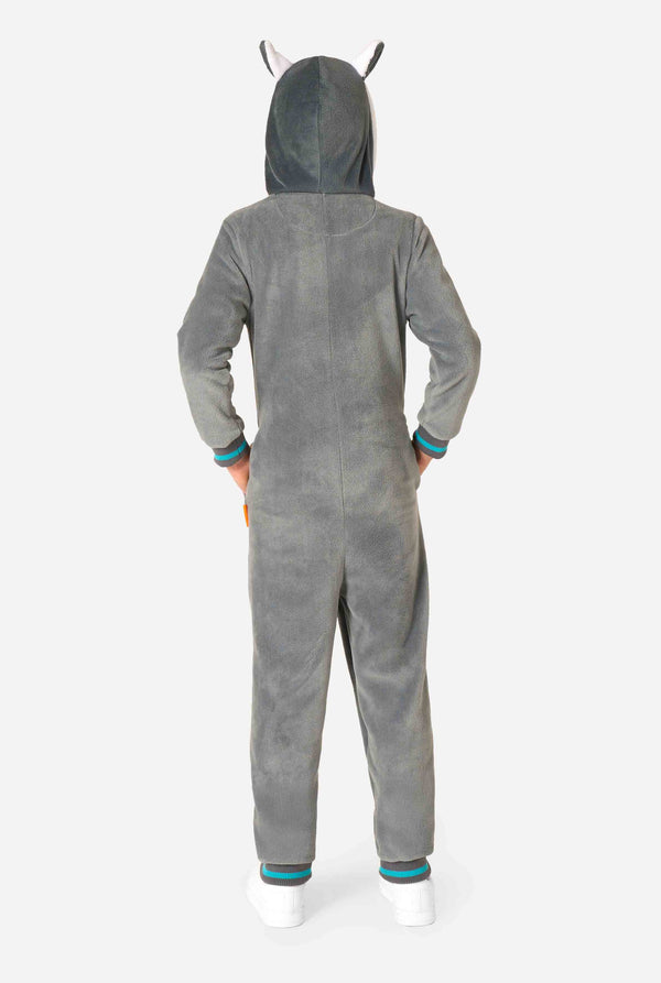 Child wearing a cozy unisex kids onesie designed as a lemur, featuring grey and white plush fabric, a hood with a cartoon lemur face and ears, and a playful banana print on the pocket. View from the back.