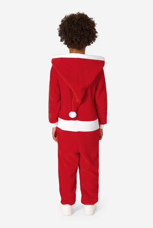 Kid is wearing a red Christmas Santa onesie, resembling a Santa suit with a hood and santa logo.