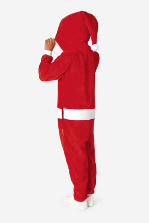 Kid is wearing a red Christmas Santa onesie, resembling a Santa suit with a hood and santa logo.