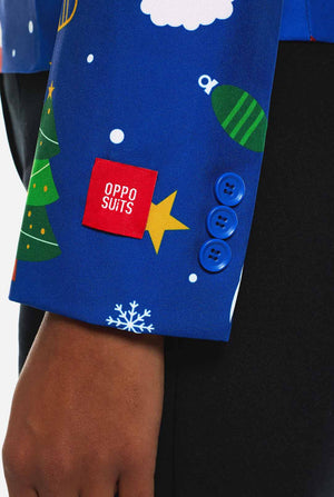 Woman wearing blue Christmas blazer for women, with Christmas icons on it.