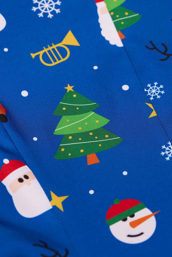 Woman wearing blue Christmas blazer for women, with Christmas icons on it.