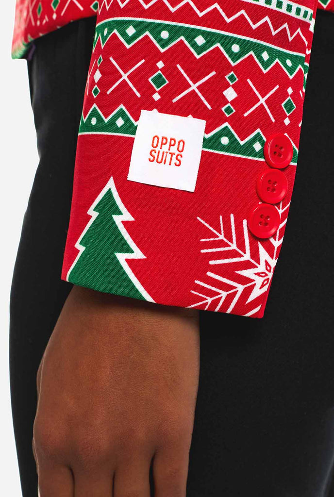 Woman wearing Christmas blazer with Winter print