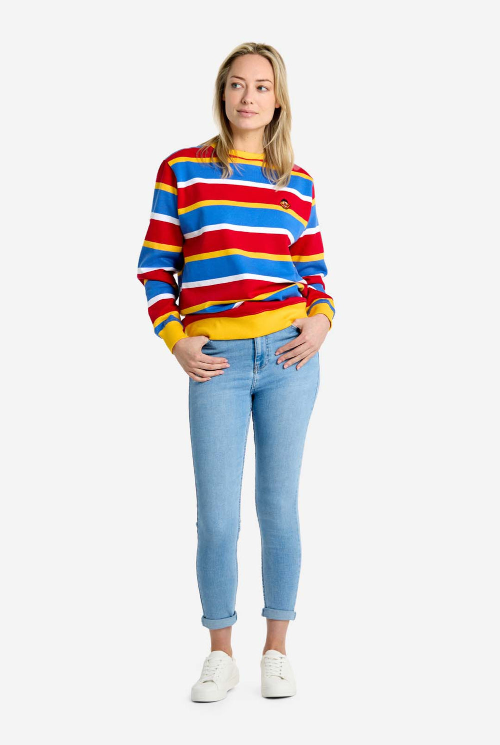 Man wearing Men's Sweater with iconic Sesame Street Ernie pattern with Yellow, red, blue and white stripes