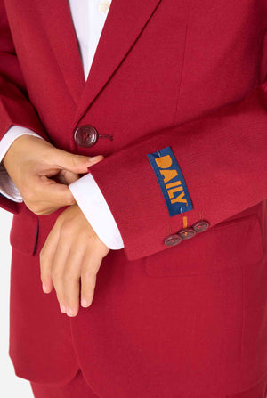 Kid wearing a stylish burgundy red suit with a white dress shirt, looking confidently. Perfect formal outfit for boys' special occasions, weddings, and parties. Sleeves close up.