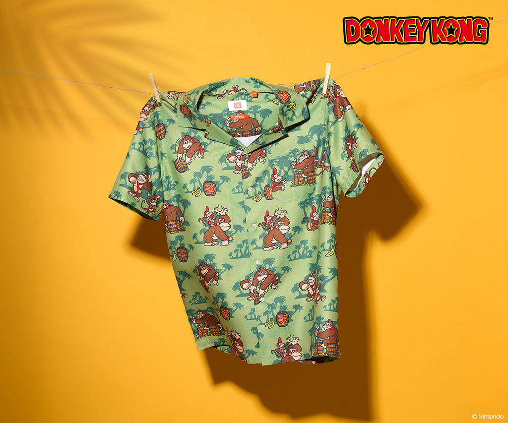 Green shirt with Donkey Kong pattern on a yellow background